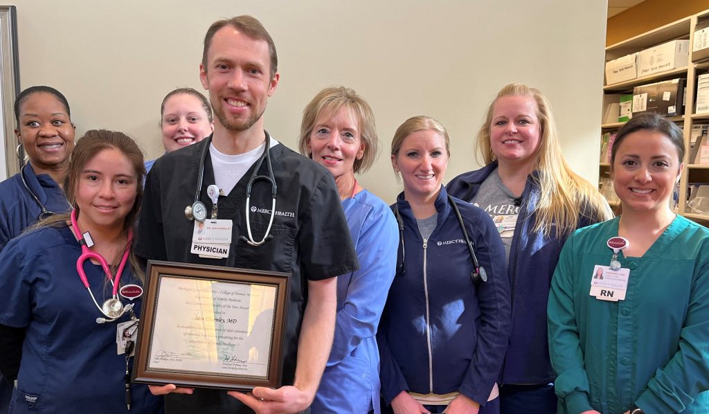 Dr. Iain Charnley receiving this year's Grand Rapids Family Medicine Preceptor of the Year award!