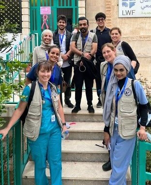 Cassi Chouinard, DO, with other members of the mission.